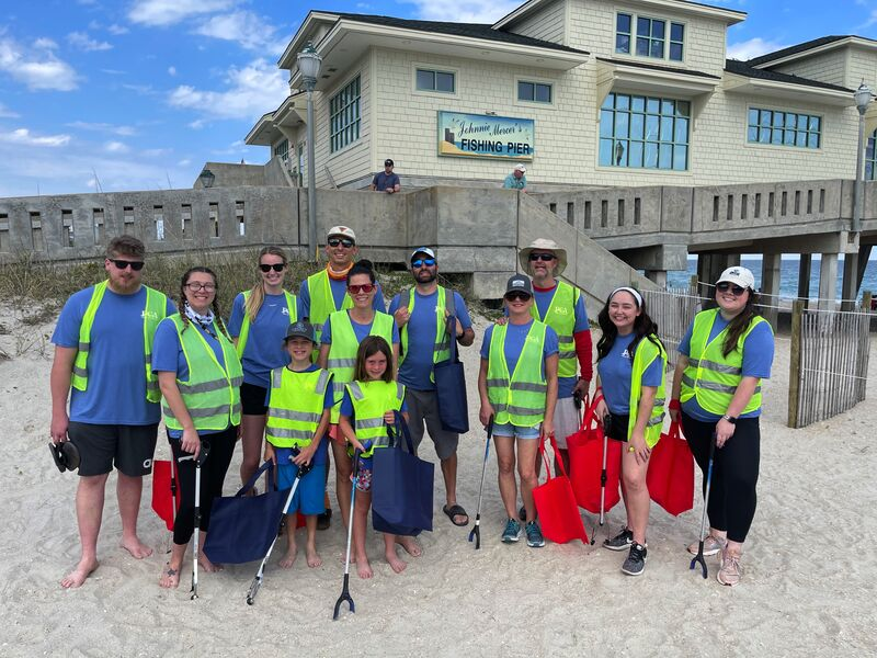 The Team from Port City Apparel in Wilmington, NC at a beach clean up.